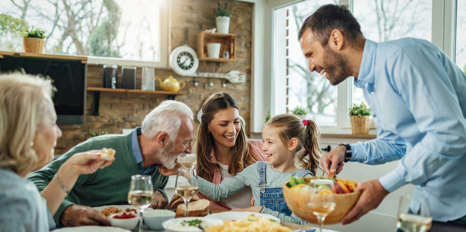 Retired couple going over paperwork with an estate planner